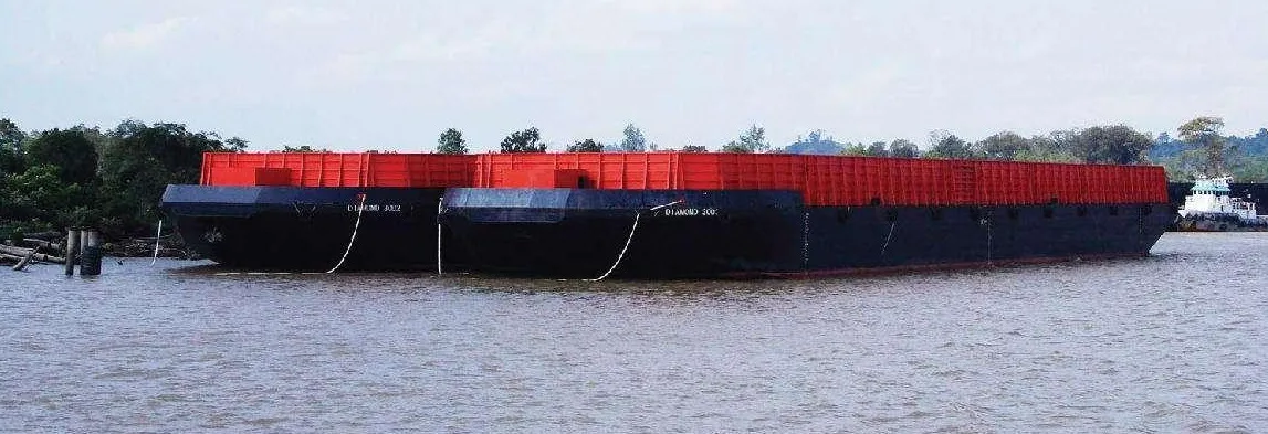 THS barges Diamond 3002 and Diamond 3003 moored side by side on a river